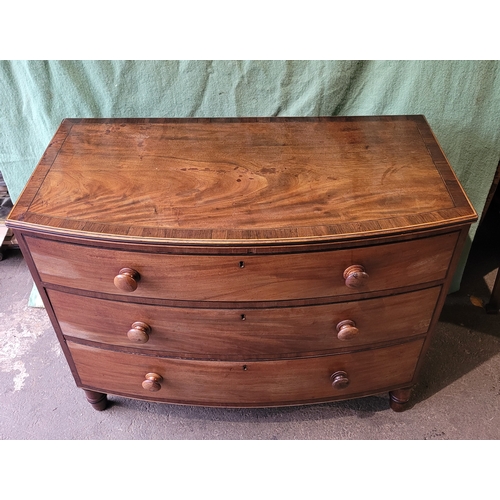584 - 19th century Mahogany bow front chest of three drawers