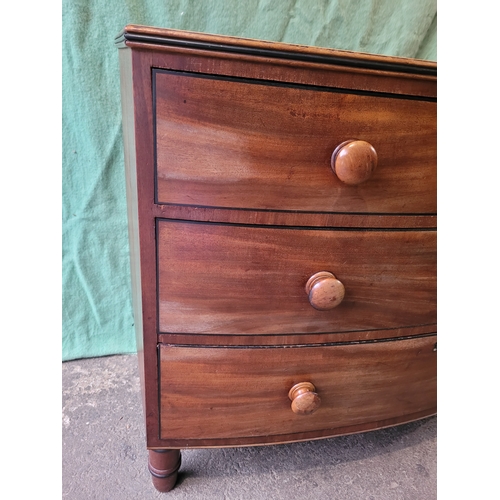 584 - 19th century Mahogany bow front chest of three drawers