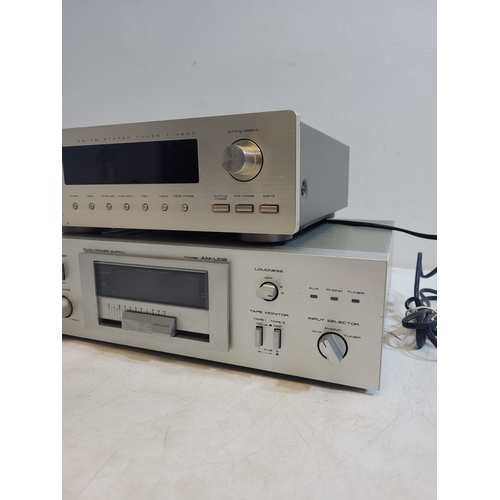 304 - Teac AM/FM stereo Tuner T-H500 and Akai stereo integrated amplifier AM-UO2