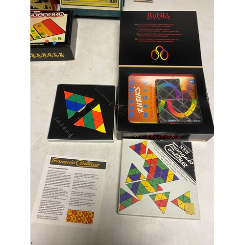 225 - A collection of Tabletop games including Go, Taxi, Pirate and Traveler, Quadwrangle, Halma, Draughts... 