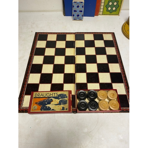 225 - A collection of Tabletop games including Go, Taxi, Pirate and Traveler, Quadwrangle, Halma, Draughts... 