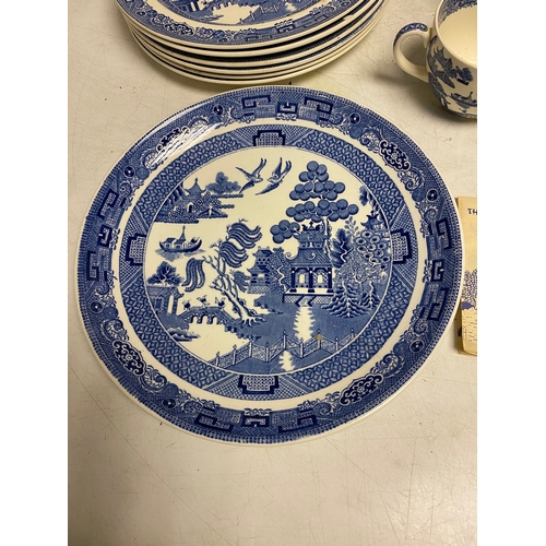 228 - Large collection of Wedgwood -The Blue Willow story with and assortment of Plates, saucers cups, jug... 