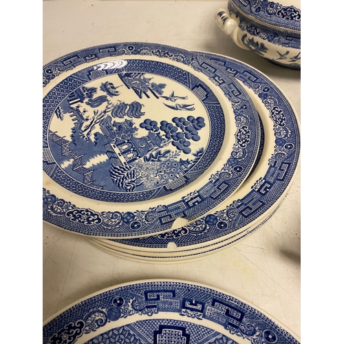 228 - Large collection of Wedgwood -The Blue Willow story with and assortment of Plates, saucers cups, jug... 