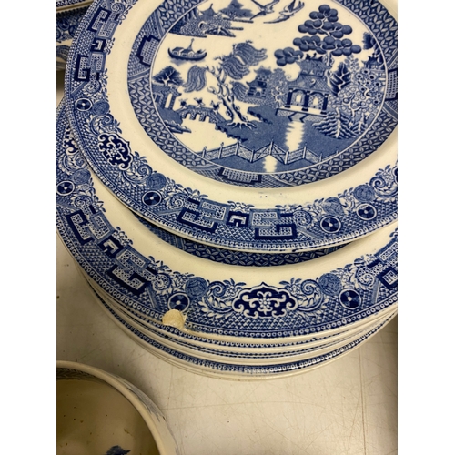228 - Large collection of Wedgwood -The Blue Willow story with and assortment of Plates, saucers cups, jug... 