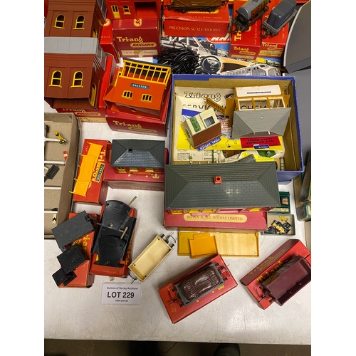 229 - Large collection of boxed Tri-ang Railways including RB Train Set, tracks, terrain, building and car... 