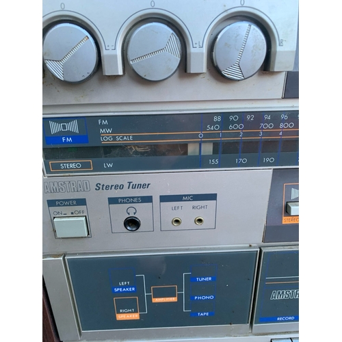 636 - Amstrad Stereo Hi Fi Tower and speakers