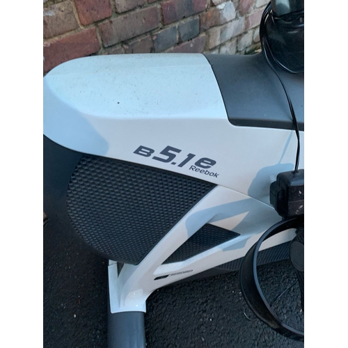 498 - Reebok B5.1 e exercise bike and a FXB Extreme Exercise bike