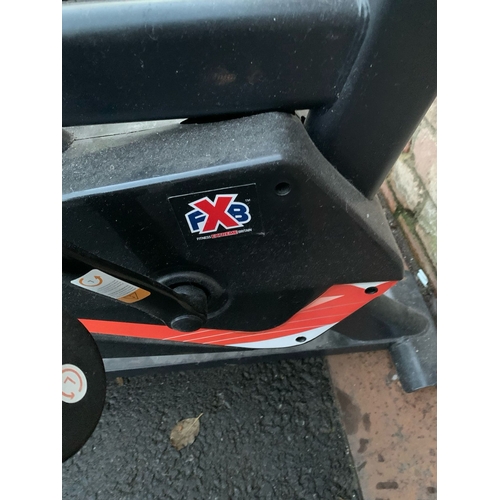 498 - Reebok B5.1 e exercise bike and a FXB Extreme Exercise bike
