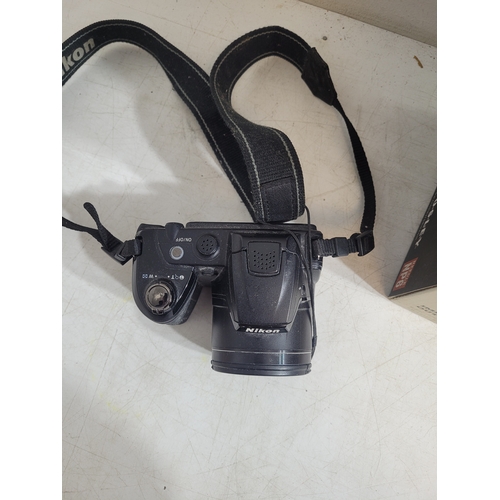 314 - New in box Crosley cruiser 3 speed portable turntable and a Nikon Coolpix L310  camera