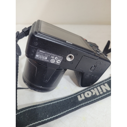 314 - New in box Crosley cruiser 3 speed portable turntable and a Nikon Coolpix L310  camera