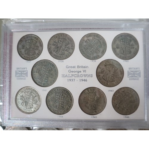 87 - A collection of commemorative con collections mainly Great Britain includes crowns, half crowns , fa... 