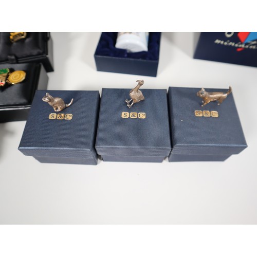 88 - A collection of Guinness Limited Edition Pin Badges, S&CO Sterling Silver miniature cats & duck, pew... 