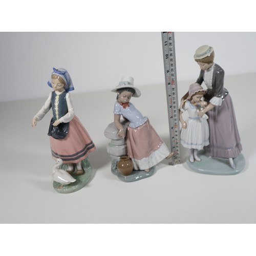 102 - Lladro Solace mother comforting daughter, A step in time and Josefa feeding duck porcelain figurines... 