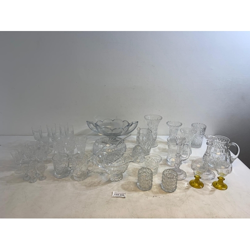 234 - Collection of finely cut crystal including jugs, bowls, tumblers, vases and more
