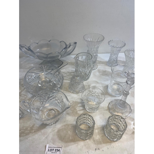 234 - Collection of finely cut crystal including jugs, bowls, tumblers, vases and more