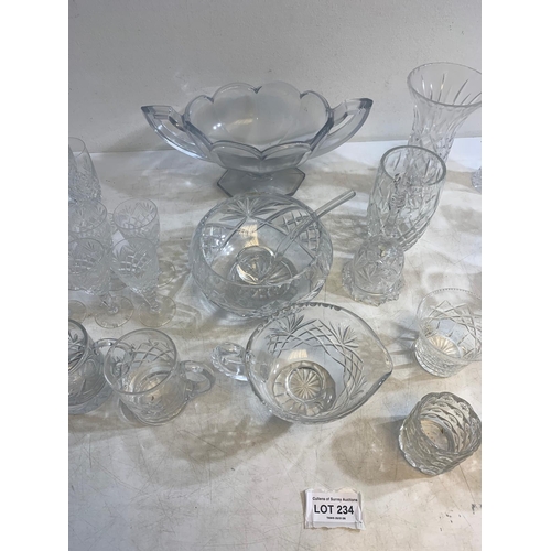 234 - Collection of finely cut crystal including jugs, bowls, tumblers, vases and more