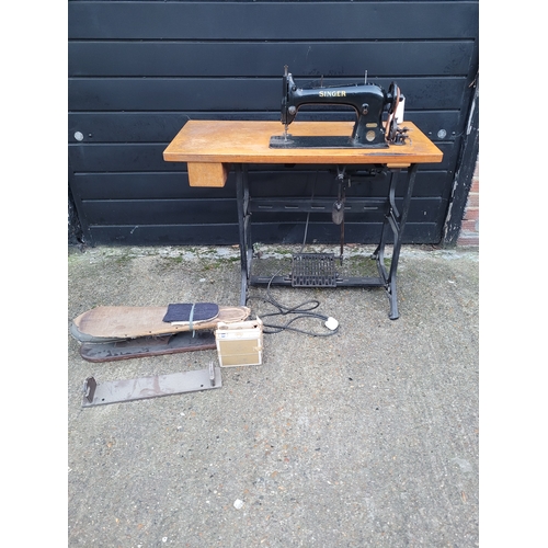 674 - Vintage singer 31K15 sewing machine on treadle
