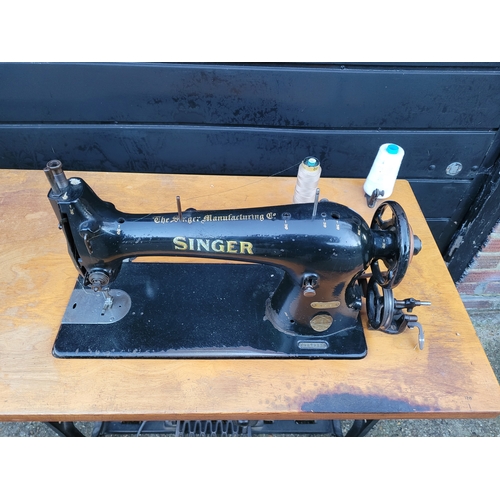 674 - Vintage singer 31K15 sewing machine on treadle
