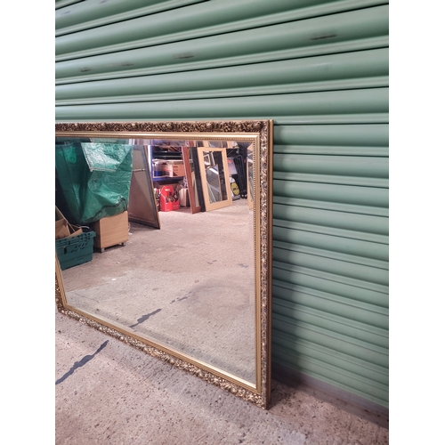 306 - Large gilt frame bevelled mirror
