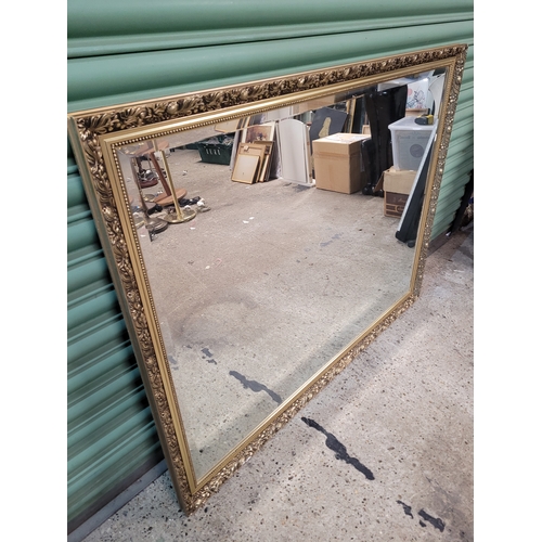306 - Large gilt frame bevelled mirror