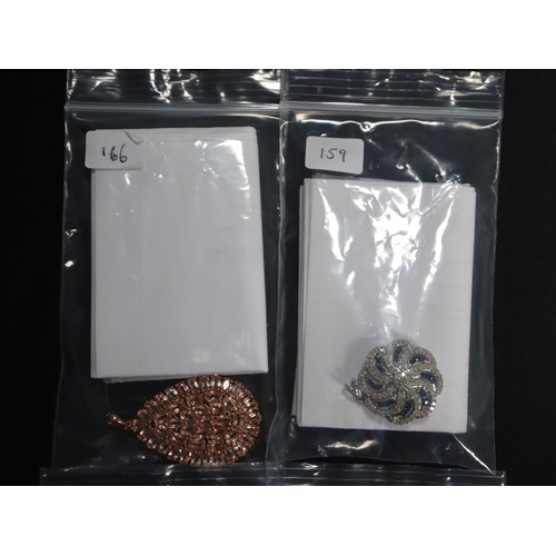 39 - 7ct Zambian Emerald Sterling Silver Pendant (2), 1.50ct Blue & White Diamond Sterling Silver Pendant... 