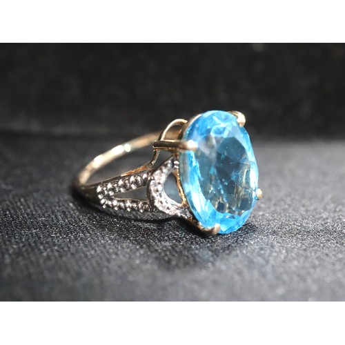 66 - Swiss Blue Topaz & White Zircon 9K Gold Ring 7.55ct Size N-O & Swiss Blue Topaz & White Zircon 9K Go... 