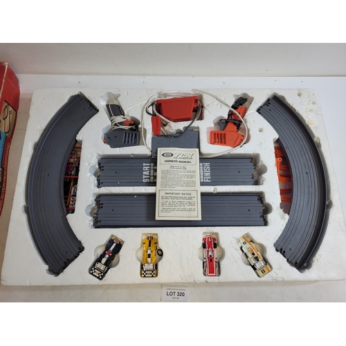 327 - Vintage TCR Total Control Racing 

The Total control slot less racing system