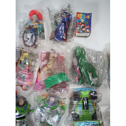 136 - Toy Story - A collection of Buzz Lightyear Action Figures in various sizes + sealed McDonalds toys v... 