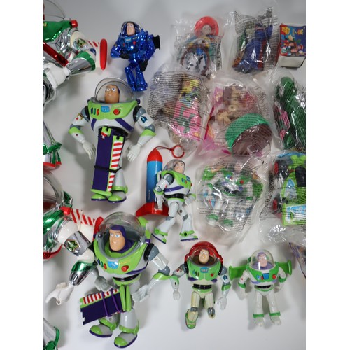 136 - Toy Story - A collection of Buzz Lightyear Action Figures in various sizes + sealed McDonalds toys v... 
