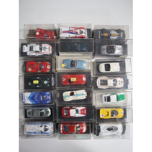 144 - A collection of cases 1:43 scale die cast model racers includes LeMans, Touring and domestic Porsche... 