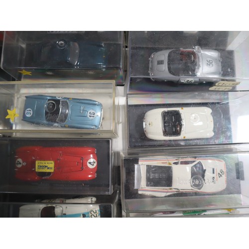 144 - A collection of cases 1:43 scale die cast model racers includes LeMans, Touring and domestic Porsche... 