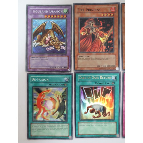 154 - Yu-Gi-Oh A collection of over 600 cards + Beckett Yu-Gi-Oh Collector Book from 2003 including Rare, ... 