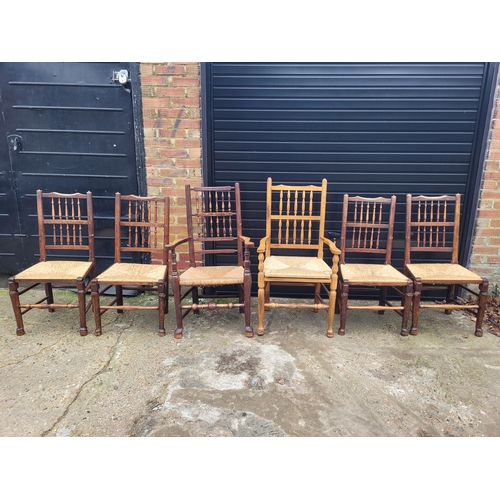 696 - Five 19th century Oak spindle back rush chairs and carver + later 20th century carver