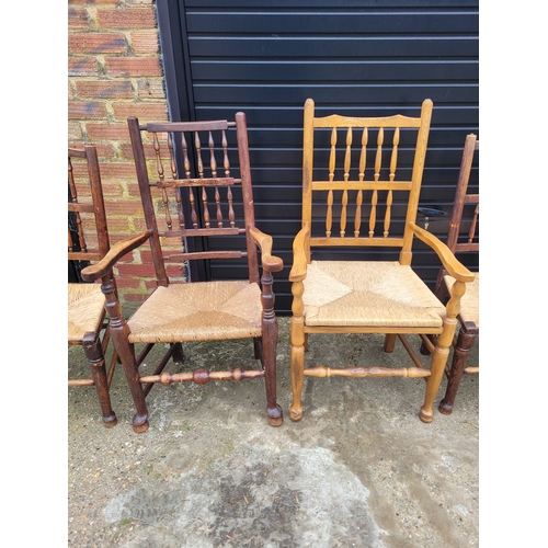 696 - Five 19th century Oak spindle back rush chairs and carver + later 20th century carver