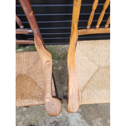 696 - Five 19th century Oak spindle back rush chairs and carver + later 20th century carver