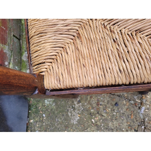 696 - Five 19th century Oak spindle back rush chairs and carver + later 20th century carver