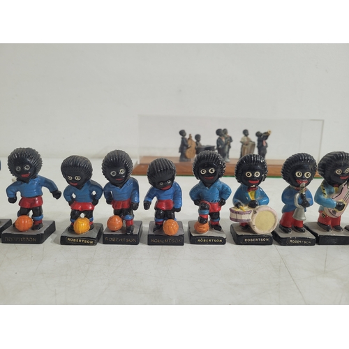 319 - Collection of 16 Robertson Golly figures and set of 6 All that jazz figures