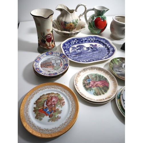 705 - A collection of ceramics items including wall hanging plates, Spode platter , Ainsley mantle clock