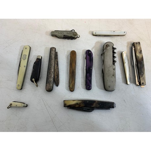 76 - A collection of 19th-20th century bone, sterling silver, mother of pearl and steel pocket & pen kniv... 