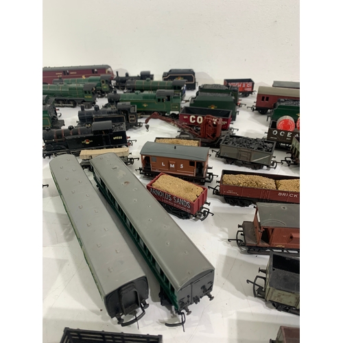 A Large Collection of model railway rolling stock comprising of ...