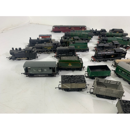 A Large Collection of model railway rolling stock comprising of ...