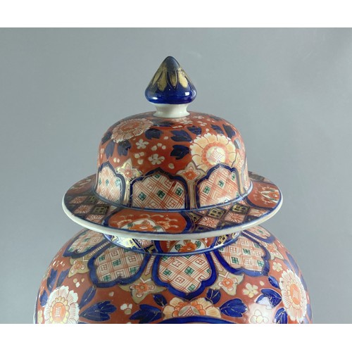 209 - Large Japanese Imari porcelain baluster vase & cover. Hand painted with sprays of blossoming sprays ... 