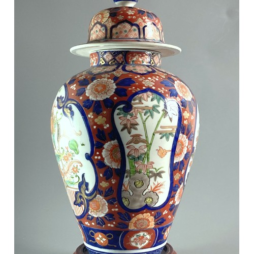 209 - Large Japanese Imari porcelain baluster vase & cover. Hand painted with sprays of blossoming sprays ... 