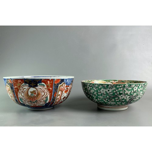 213 - Two Meiji period Jaspanese Imari bowls. One painted in green cherry blossom with stylised interior. ... 