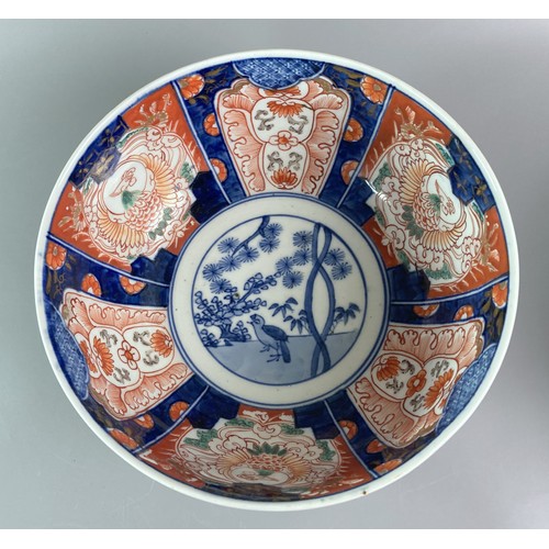 213 - Two Meiji period Jaspanese Imari bowls. One painted in green cherry blossom with stylised interior. ... 