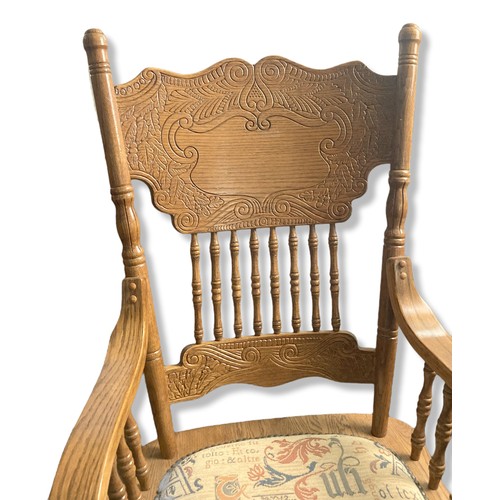 259 - Converted carved Amish Oak pressed country swivel office chair. Pressed back with turned spindles. F... 