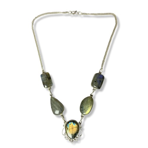 7 - A polished stone and 925 silver mounted necklace.