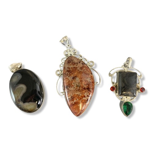 8 - Three 925 silver & polished stone chunky pendants.
Largest measures - 9cm long.