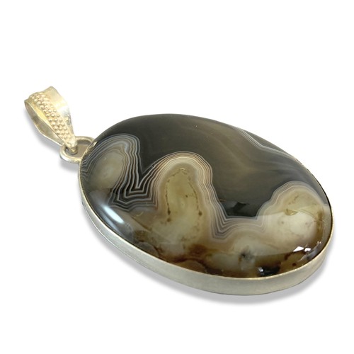 8 - Three 925 silver & polished stone chunky pendants.
Largest measures - 9cm long.