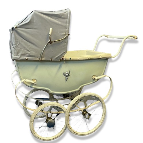 67 - Vintage Silver Cross Pram.
Lime green with grey hood.
90cm tall